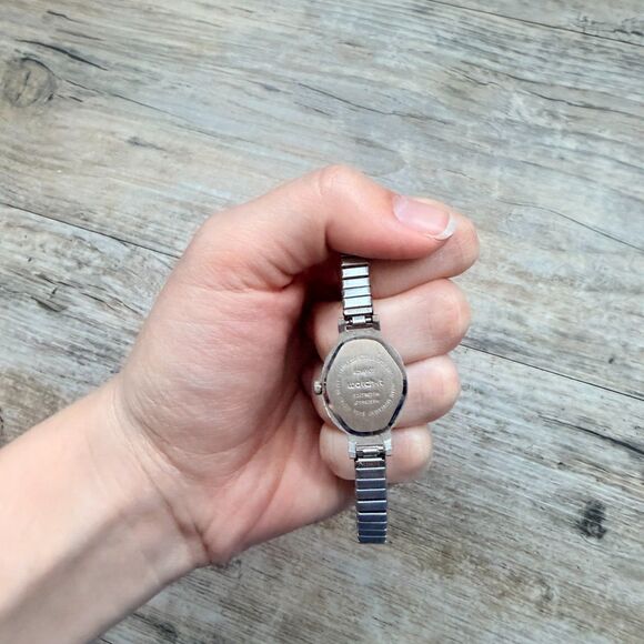 Vintage Dainty Silver Tone Watch Stretch Band Oval Face Minimal Classic 90s main image 7